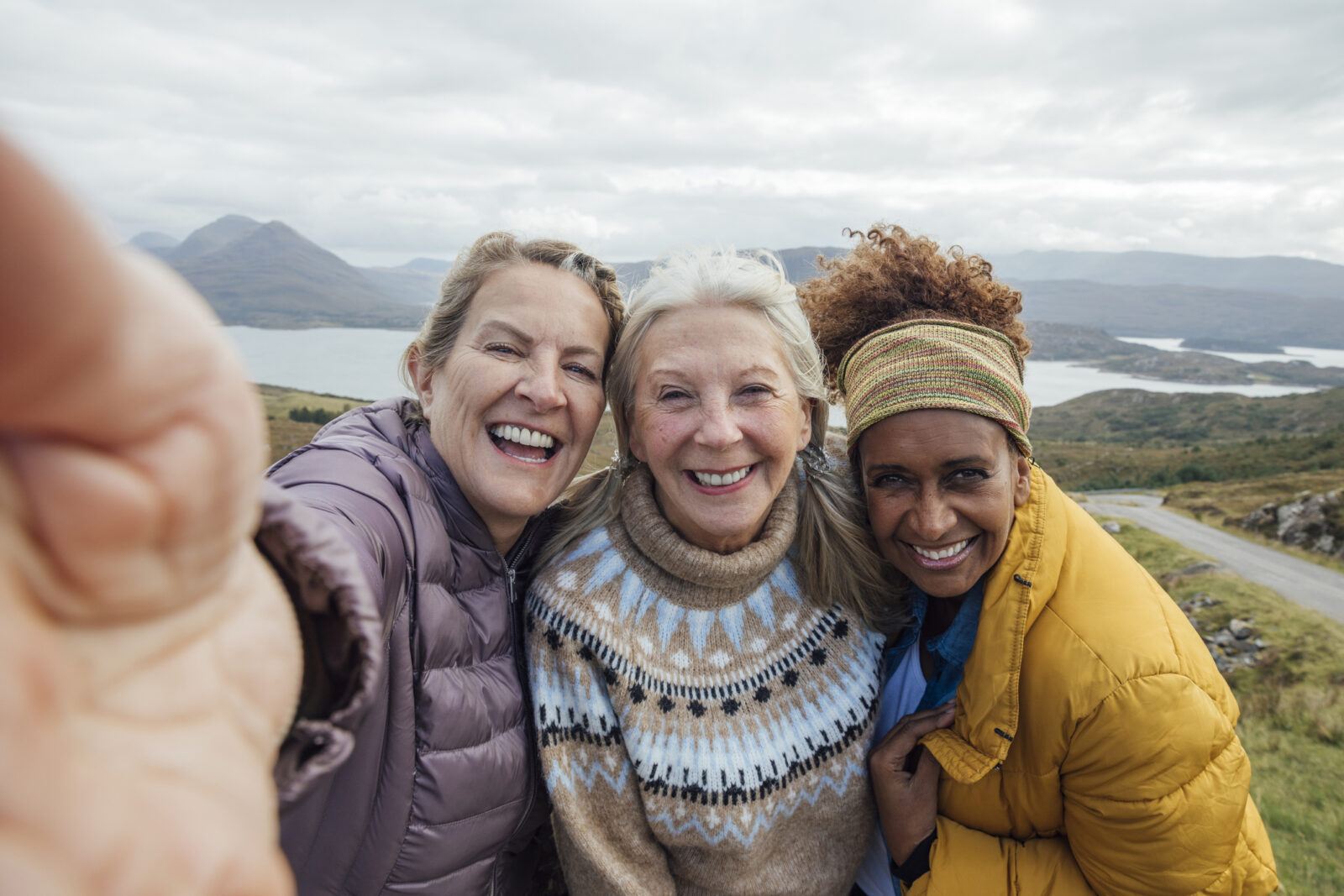 A close up selfie of three senior women.